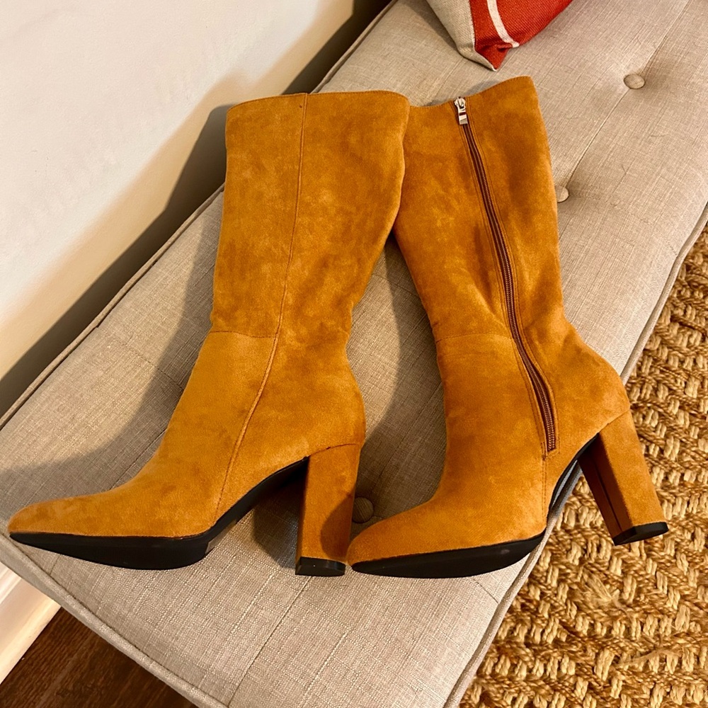 Tan suede tall boots. Never been worn/no original box. Sexy and versatile